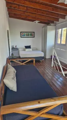 a room with a bed and a mattress at Dúplex La Delfina 3 in Villa Carlos Paz