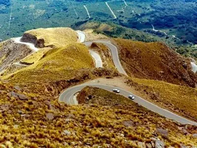 a winding road on the side of a mountain at Alojamiento Quilo in Merlo