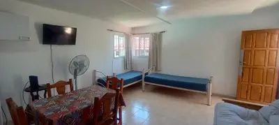 a room with a room with a bed and a table at Nuevos Aires de San Antonio in San Antonio de Arredondo
