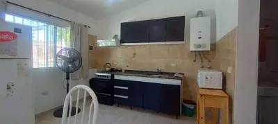 a kitchen with a sink and a stove in it at Nuevos Aires de San Antonio in San Antonio de Arredondo