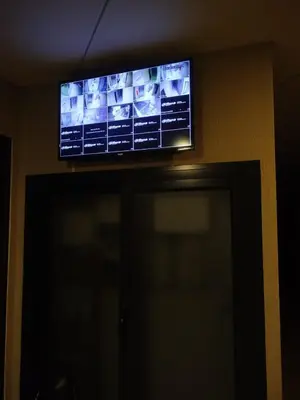 a flat screen tv on a wall above a door at Departamento MIRALEJOS 14 in Villa Carlos Paz