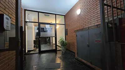 an open door of a building with a brick wall at Terrazas de San Juan in Cordoba