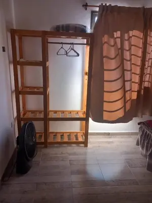 a room with a window with a curtain at 2 Dormitorios y pileta in Villa Anizacate