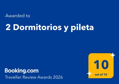 a yellow box with the number on it at 2 Dormitorios y pileta in Villa Anizacate