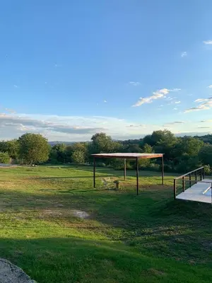 a gazebo in the middle of a field at La Casona de Tanti in Tanti