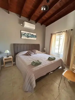 a bedroom with a large bed in a room at 