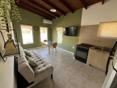 a living room with a couch and a table at 