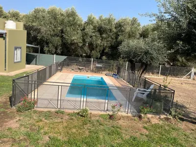 a swimming pool with a fence around it at 