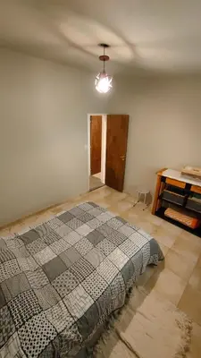 a bedroom with a bed and a ceiling at Apartamento Urbano Bialet Masse in Bialet Massé