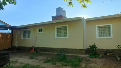 a house with a chimney on top of it at Apartamento Urbano Bialet Masse in Bialet Massé
