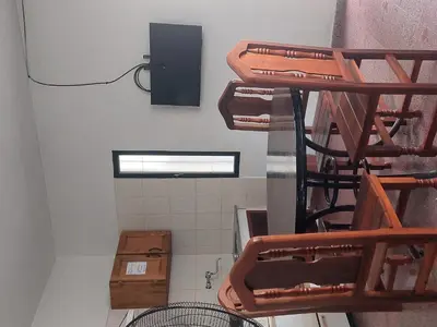 a room with several bunk beds in a bathroom at La casa de Los Patitos in Arroyo de Los Patos