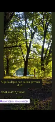 a picture of a park with trees in the background at La casa de Los Patitos in Arroyo de Los Patos