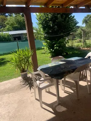 a table and chairs sitting on a patio at El despertar Hospedaje in San Francisco del Monte de Oro