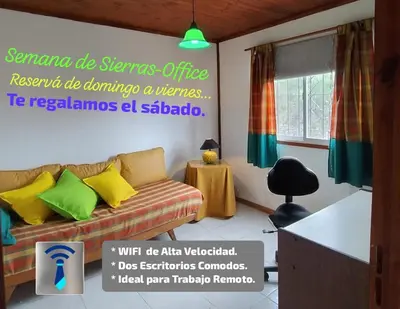 a living room with a couch and a table at Tinkunaco Alta Gracia in Alta Gracia