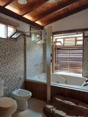 a bathroom with a tub and a toilet and a sink at soy ahora in Pueblito