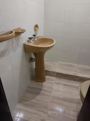 a bathroom with a sink and a toilet at Departamento centro Carlos Paz in Villa Carlos Paz