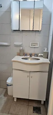 a bathroom with a sink and a toilet at Monoambiente Centro in Cordoba