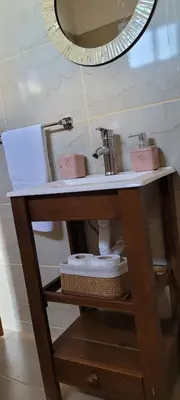 a bathroom with a sink and a mirror at Pedrolandia in Mina Clavero