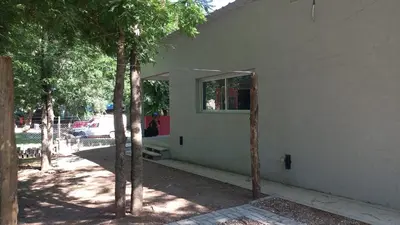 a building with a window on the side of it at La casa del león in San Antonio de Arredondo