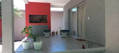 a room with two toilets and potted plants in it at La casa del león in San Antonio de Arredondo