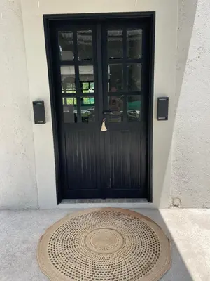 a door of a building with a mat in front of it at Casa calma in Villa de Las Rosas