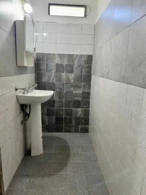 a bathroom with a sink and a mirror at La Casa De Juan in Mina Clavero