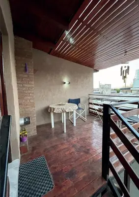 a room with a table in the middle of a room at Departamento de 2 a 5 personas in Villa Carlos Paz