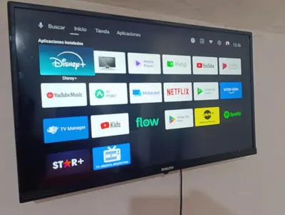a flat screen tv with a bunch of logos on it at Soles in Cordoba