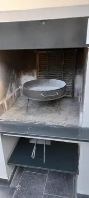 a black table with a table on top of it at Miralejos 2 in Villa Carlos Paz