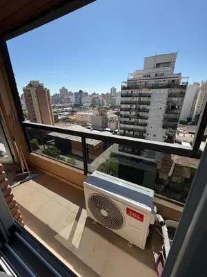 a room with a window with a air conditioner at Cañada 12 depto 1 dormitorio pax 3 in Cordoba