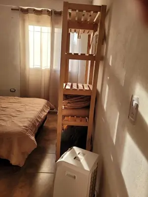a room with a bunk bed and a bunk bed gmaxwell gmaxwell gmaxwellythonythonython at Mate host in Cordoba