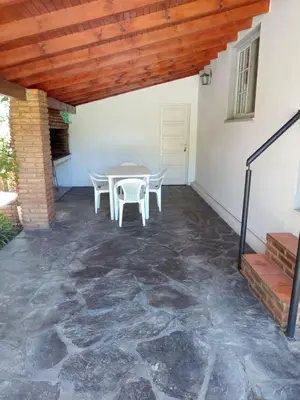 a patio with a table and chairs on it at Valle de Bendición in El Rincón