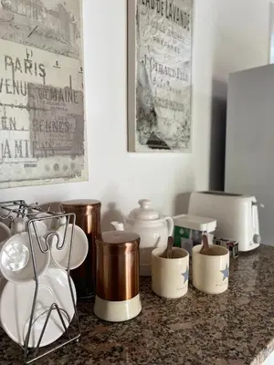 a counter top with a bunch of items on it at Serena in Villa de Las Rosas