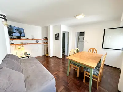 a living room with a couch and a table at departamento temporal 3 personas in Cordoba