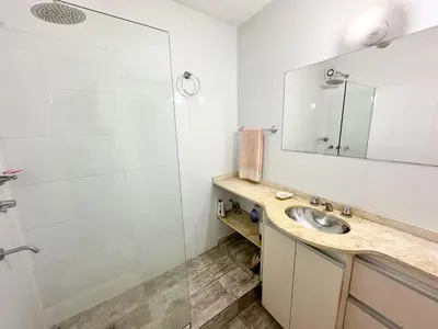 a bathroom with a sink and a mirror at departamento temporal 3 personas in Cordoba