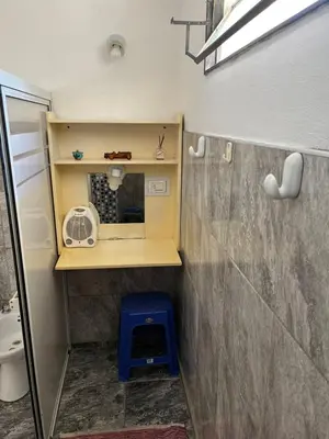 a small bathroom with a sink and a mirror at Crisol departamento in Alta Gracia