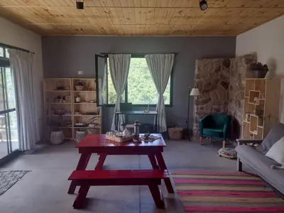 a living room with a table and a couch at 