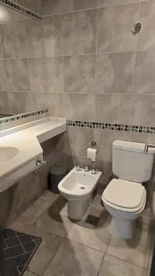 a bathroom with a toilet and a sink at COFICO DPTO de CATEGORIA in Cordoba