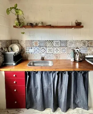 a kitchen with a sink and a counter top at La Donosita in La Carolina in La Carolina