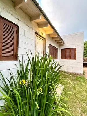 a white house with plants in front of it at La Donosita in La Carolina in La Carolina