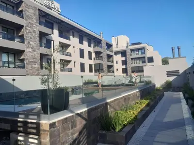 a view of the building from the courtyard at Las Pircas Housing in Alta Gracia