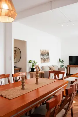 a dining room with a table and chairs at Piso completo en el centro de cordoba, muy amplio especial para familias in Cordoba