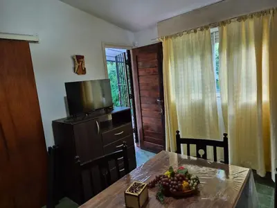 a kitchen with a table with a bowl of fruit on it at Don EDELMI 2 in Cordoba