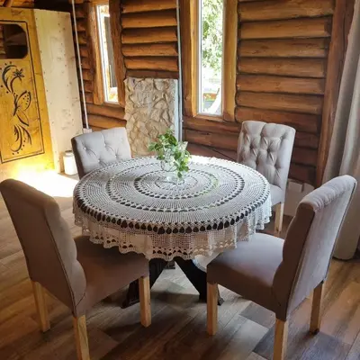 a dining room table with two chairs and a tableasteryasteryasteryasteryasteryastery at Cabaña Cielos del Champaqui 6 kms VGB in Villa Ciudad Parque