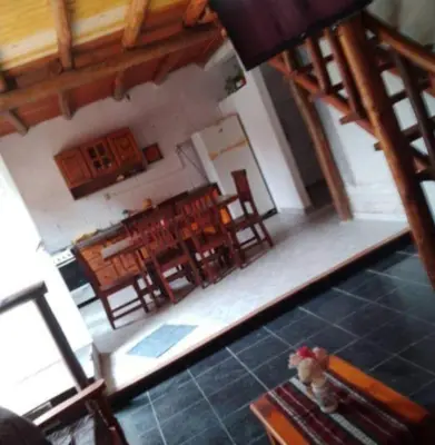 an aerial view of a room with chairs and a table at cabaña rustica in Bialet Massé