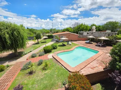 an overhead view of a swimming pool in a yard at La Margarita Aparts - Solo 2 Pax in Mina Clavero