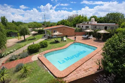 an image of a swimming pool in a yard at La Margarita Aparts - Solo 2 Pax in Mina Clavero