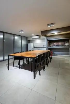 a large dining room with a large wooden table and chairs at Depto 2 Dormitorios Pilay F Temporario in Cordoba