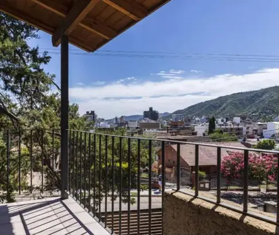 a balcony with a view of a city at Mirian house in Villa Carlos Paz