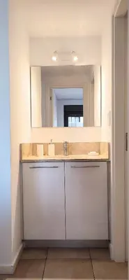 a bathroom with a sink and a mirror at Rincón Córdoba in Cordoba